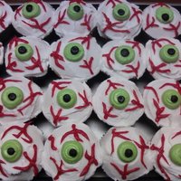 Eye-Ball Cupcakes Sugar cookie decorated with RI