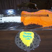 Briana's Guitar Cake This cake was made for my daughter's 7th Birthday she had a Hannah Montana Theme and a friend of her's birthday was the day we...