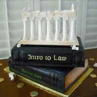 Acropolis On Books Cake was made for a young man that was graduating College (Business Economics Major), was going into Law School , but was first going to...