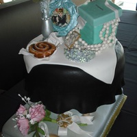 "breakfast At Tiffanys" Cake for a 21 year old girl's birthday by the name of Kellie.The silver bottom (floor area) is cake,the table top is cake...and...