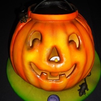 "jack-O-Lantern" Rear 3/4 of this is carved cake. The front has been cut off and a bottom ledge made inside for the tealight candle to sit on so that you...