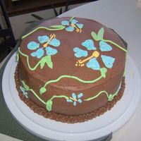 Hawaiian Hibiscus Flower Chocolate Cake This is my third cake to complete. It is a chocolate cake with a dark chocolate ganache filling and Toba Garrett's chocolate...