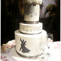 5 Tiers The bottom and top are both double tiers, while the middle is a single. Bottom tier has a handcut silhouette, middle and top are edible...