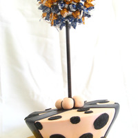 Single Tier Topsy Turvey With Chocolate Adorned Topiary Topiary was covered in the girls favorite choclates...Hershey's kisses of course!!