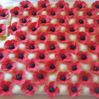 Stylized Poppies Flowers made as christening cupcake toppers. All 80 of them!