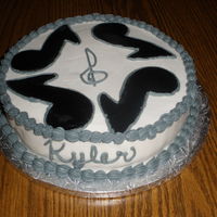 Music Note Cake White cake with Music notes for a 14 year old birthday party.