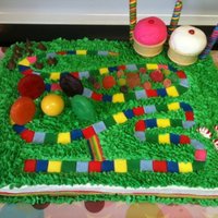 Candy Land Cake Candy Land Cake for a 5 year old's birthday. Oooohhhhh, the left over candy! I think I have a tummy ache!