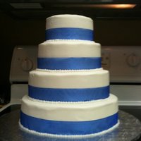 Wedding Cake With Blue Ribbon Round wedding cake with BC.