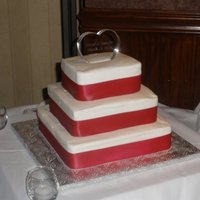 3 Tier Square Wedding Cake The bride wanted a simple cake and sheet cakes in the kitchen to save money.