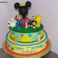 Mickey Mouse Clubhouse I got this idea from a picture of one I saw online, I dont remember where. I made the the topper out of RK and it was my first timeusing RK...