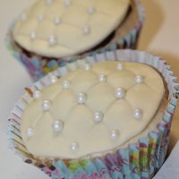 Fondant Cupcake I was just playing around with a few leftover cupcakes. I had no tools so I did this all by hand.