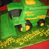 Combine Birthday Vanialla cake with almond butter cream. Fondant and gumpaste accents. Tires are RCT and so is the cab... not bad for a first