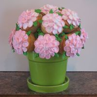 Cupcake Bouquet This is my first attempt at a cupcake bouquet. I saw picutes of these on this site and had to try it. Thanks CC for the inspiration.