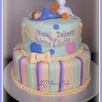 Baby & Stork 10" & 7' WASC w/chocolate buttercream. Gumpaste stork and baby using mold, which i love:) Thanks to this site for inspiration...