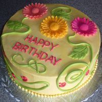 Daisy Cake Buttercream with MMF daisies and vines for a woman's birthday. I finally figured out how to make the JEM daisy cutters work!! THIN...