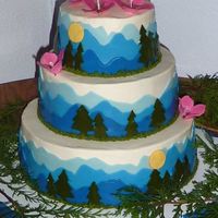 Mountain Wedding Cake The groom was in charge of the cake and he wanted Alaskan mountains and some small Fireweed blossoms. Buttercream with MMF accents and...