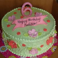 Madison Birthday Buttercream with MMF accents and gumpaste number with edible glitter.