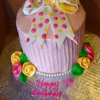 Girly Girl Gumpaste bow w/buttercream dots, fondant flowers and buttercream frosting