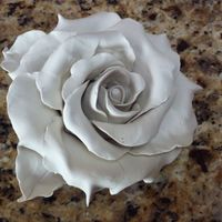 Rose Made Without Cutters I tried my hand at making a rose without using cutters or molds, just rolling balls and then shaping them with my fingers. It was easier...