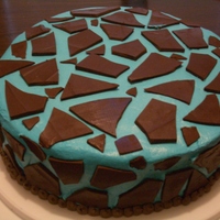 Mosaic/giraffe This one is supposed to be whatever you see, whether it be a mosaic or a giraffe. It's just broken bits of dark chocolate laid on top...