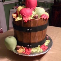 Harvest Barrel 4 layers - alternating chocolate and yellow with IMBC filling. Apples are KRT's and everything else is made from fondant. TFL