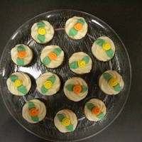 Roses Cupcakes These cupcakes went with the shower cake I did in orange and yellow.