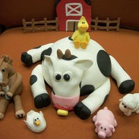 Farm Animals These little farm animals are going on a baby shower cake. The horse is holding a bottle. His shoes are on backwards. The cow has a...