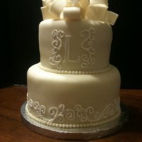 White/ivory Cake red velvet cake with fondant and royal icing accents