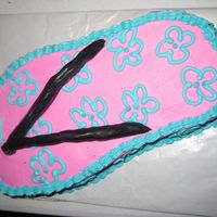 Flip Flop flip flop carved from chocolate cake, covered in buttercream with fondant straps