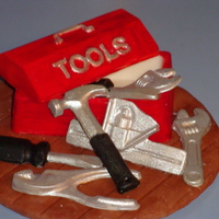 Tool Box I made these last Christmas for a family gag gift exchange. They are white chocolate made with a mold. Colored with luster dust