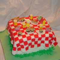 Summer Picnic this was so fun to make. Table cloth is fondant, food is gumpaste.