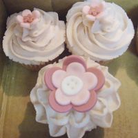 Whimsical Garden Cupcakes These are strawberry lemonade cupcakes with a vanilla buttercream frosting. The fondant flowers were made to match the nursery bedding that...