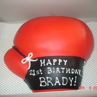 Boxing Glove Birthday Cake I made this cake for a friend who is a boxer. Choclate cake with fondant.