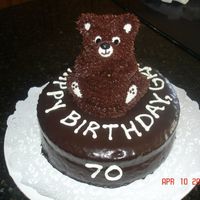 Grandpa's 70Th Teddy Bear Birthday Cake My dad turned 70 today. I made him this teddy bear cake. Marble cake with choc ganache, teddy bear pan topper decorated in buttercream. He...