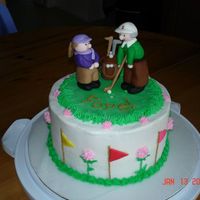 Golfing In-Laws My in-laws, who love golf, are visiting us. I used the excuse to make this cake. The golfers and golf bag are MMF -- they really do look...