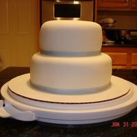 First Fondant Cake Ever! This is my very first try at covering a cake in fondant. It was a little tricky at first! I am very happy with how it turned out. Thanks...