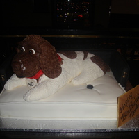 My Dog Jazz In His Bed Dog in a doggie bed . The dog was made of RKT and Fondant and the bed was the cake. The dog was an exact replica of the client's dog...