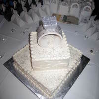 3-D Engagement Ring Made Out Of Fondant And Gumpaste The stone is made out of fondant covered with disco dust and the ring is made out of gumpaste dusted with nu silver dust. I used...