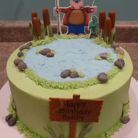 Fishing The fisherman is an edible image applied to fondant. Frosted in buttercream with fondant accents.