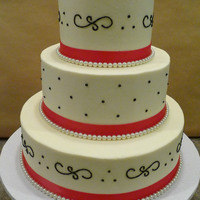 061210 Wedding Frosted in buttercream with dark pink satin ribbon and fake pearl border, black piping is royal icing