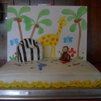 Curious George My girls love Curious George. I did this as a back-to-school cake but really I just wanted to re-create this scene from the movie in cake....