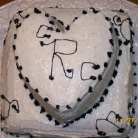 1St Ever Bridal Shower Cake Yellow cake with buttercream icing. Black buttercream for decorations. Filling was peach and strawberry preserves