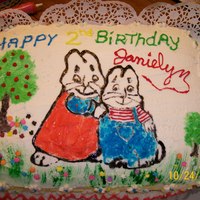 Ruby And Max This was for my baby girls 2nd Birthday. Yellow cake. 2 9x13 layers with fudge icing inbetween and deb's buttercream icing all over.