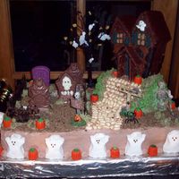 100_1117.jpg my first ever haunted house cake, i think it turned out pretty well..