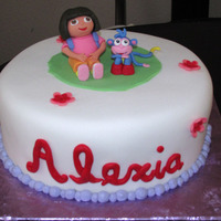 Dora And Boots Gumpaste/fondant accents/figurines.Fondant covered cake. TYFL:)