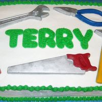 Tool Cake I made the tools out of chocolate.