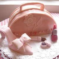 Purse And Shoe Cake This was my first fondant covered cake. Thanks boonenati for the great tutorial and templates.