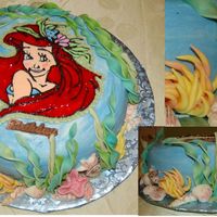 Liberty's 3Rd Birthday The cake is dark chocolate torted with Raspberry filling. All the frosting is buttercream and the seaweed and coral, etc. is made out of...