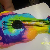 Tye Dyed Guitar Cake guitar cake for 10 yr old girl. all bc frosting, with jelly beans for the knobs.