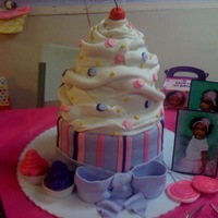 Cupcake This was made for a little cupcake turning one! I enjoyed making this cake it was fun.